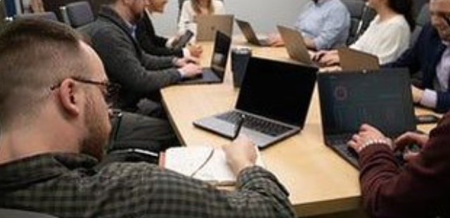 Engineers working at a conference table